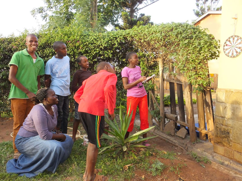 Playing darts in Nairobi, Kenya